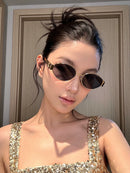 Óculos de sol ovais de metal estilo antigo Qian retrô, proteção solar feminina, armação pequena sofisticada, estilo Hong Kong, formato côncavo